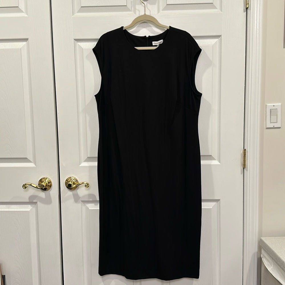 Brand new black ladies column dress.  Sleeveless.  New with tags